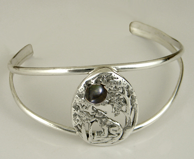 Sterling Silver Howling Wolf Cuff Bracelet With Spectrolite